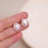 Pearl Earrings in Hand